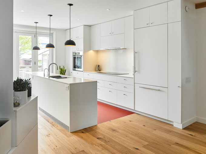 A modern kitchen featuring the Tagus wood flooring from Rustic NEUE Collection