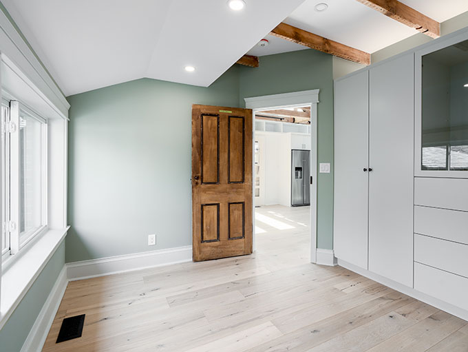 Contemporary stairway with Rustic NEUE Vltava character grade engineered European white oak wood floors